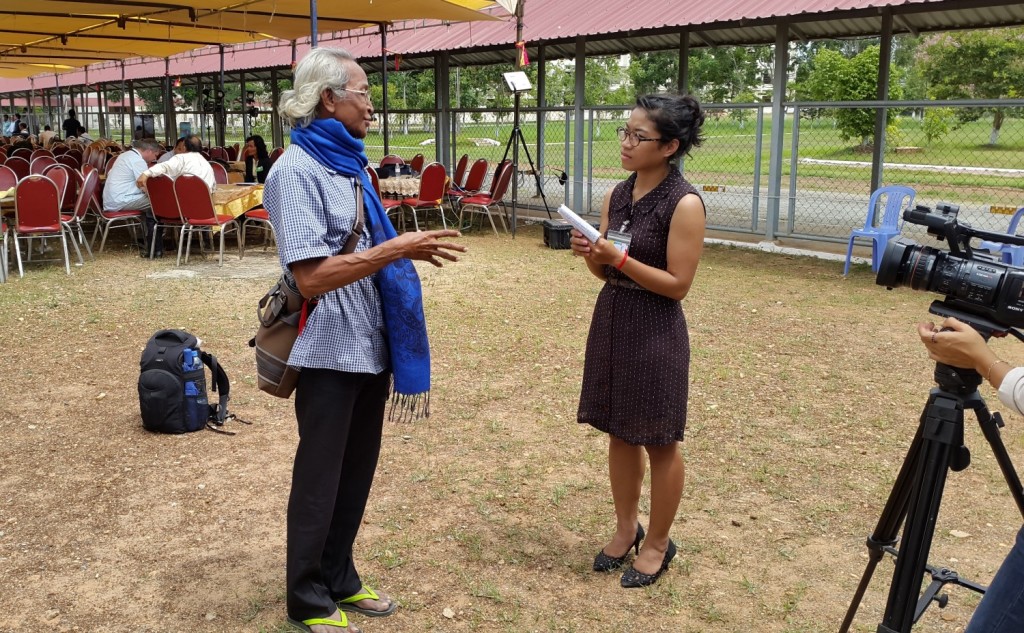 Khmer Rouge victim and prominent LGBT activist Sou Sotheavy interviewed by Sreyneath Poole after the verdict announcement of Case 002. Photo credit: DC-Cam.