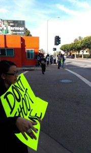 "Don't Shoot Me!" shouted a protester as a police vehicle drove by the corner of Atlantic Ave and 11th St.