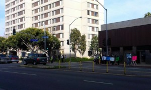 Long Beach residents of Cambodia Town join together to demonstrate against violence after the police shooting last week.